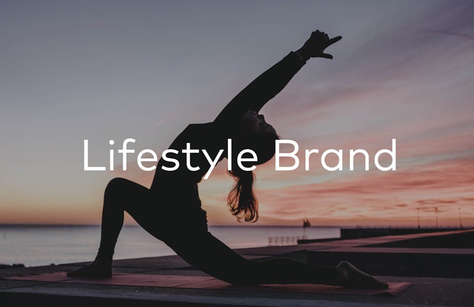 Image displaying woman doing yoga and words: Lifestyle Brand. 