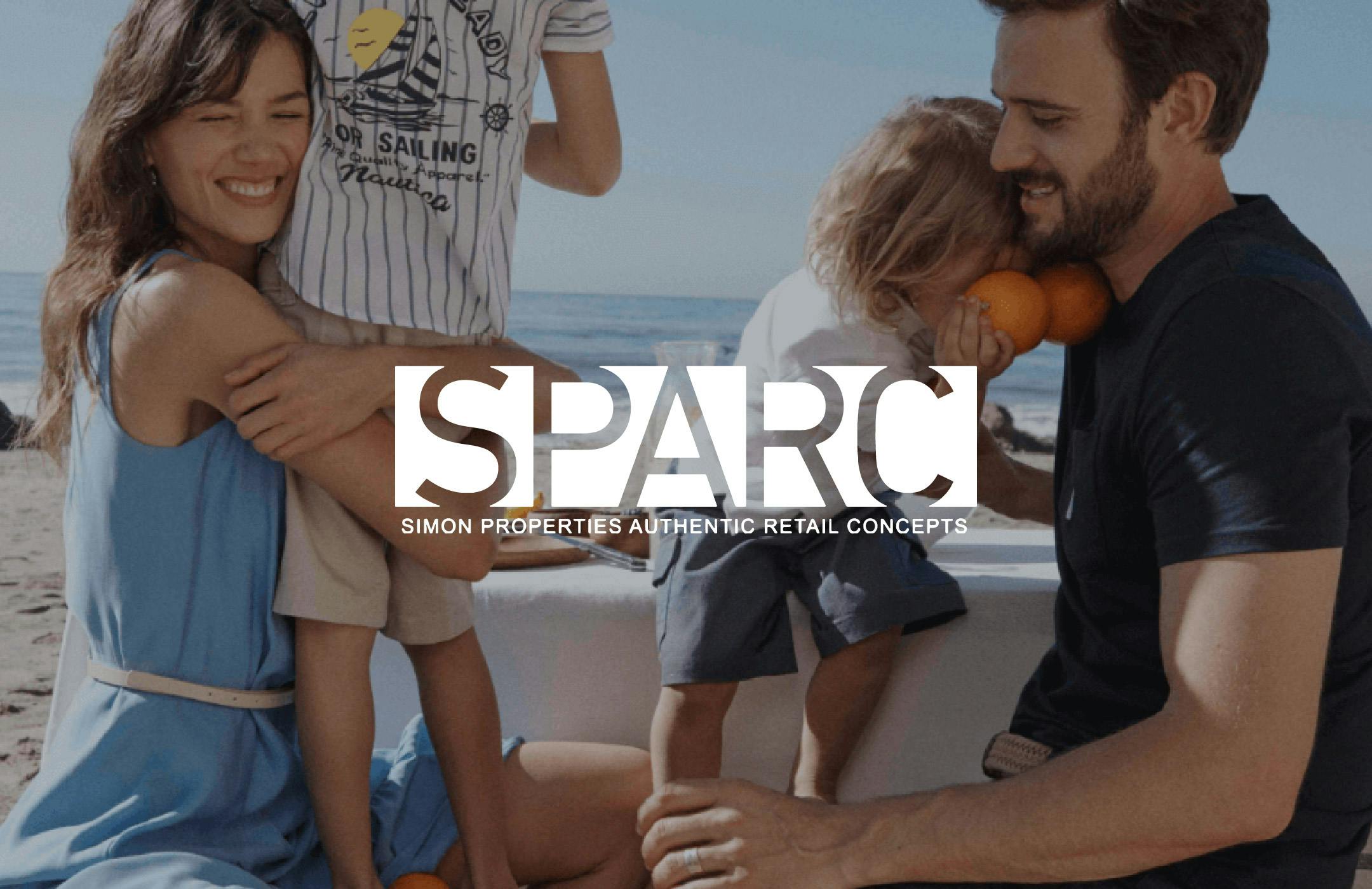 Photo of a woman hugging a child tightly and a man playing with another child, overlaid with the SPARC logo