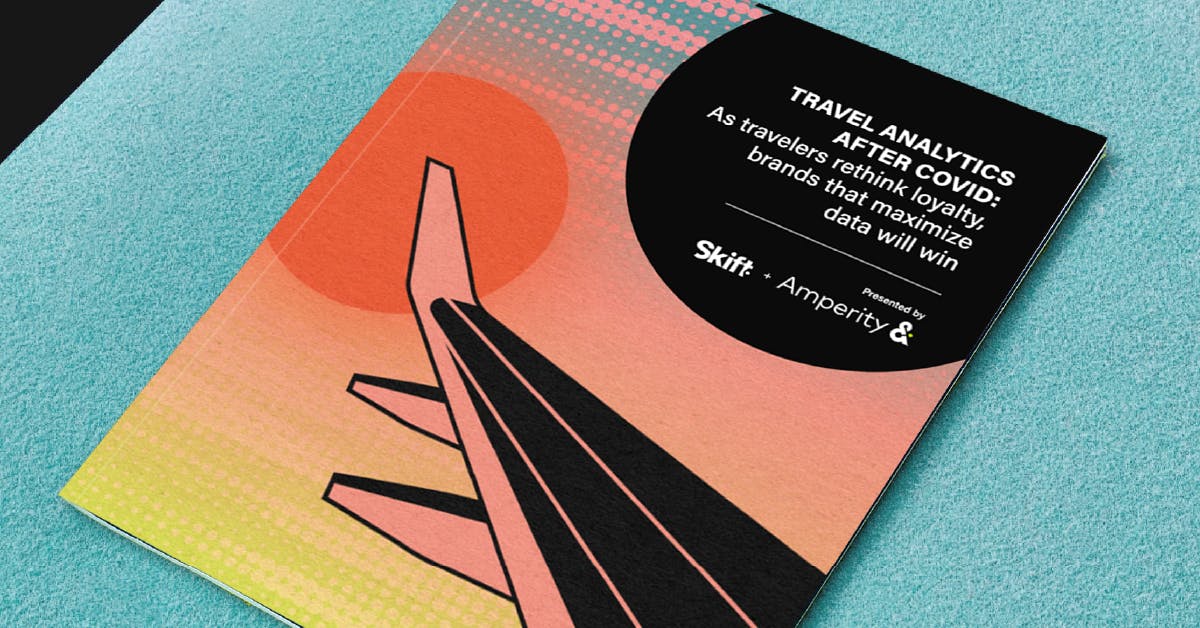Cover of the guide "Travel Analytics After COVID" with illustration of airplane wing over an orange sun at sunset.