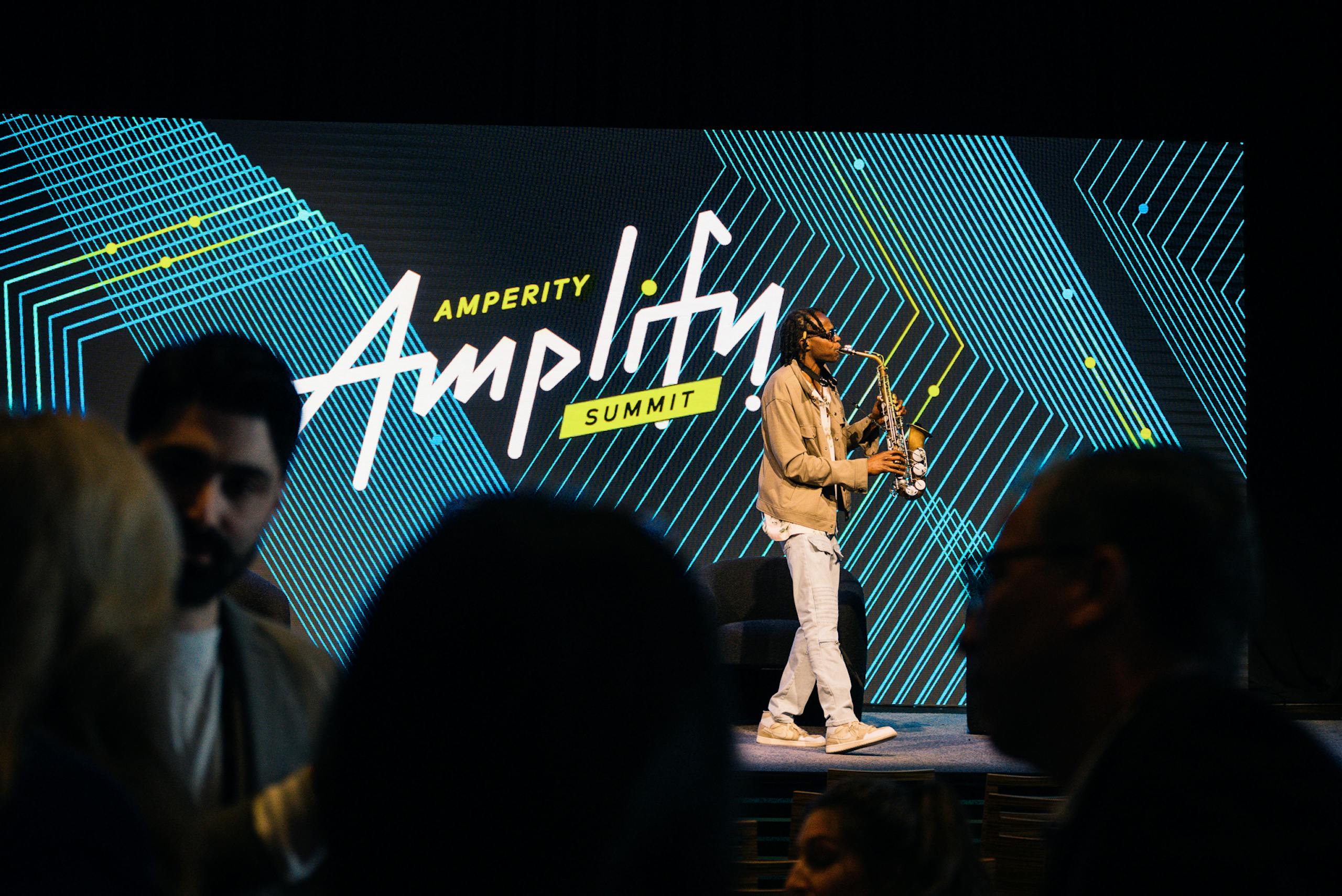 A saxophone player supplying some smooth tunes at Amplify, Amperity's annual summit