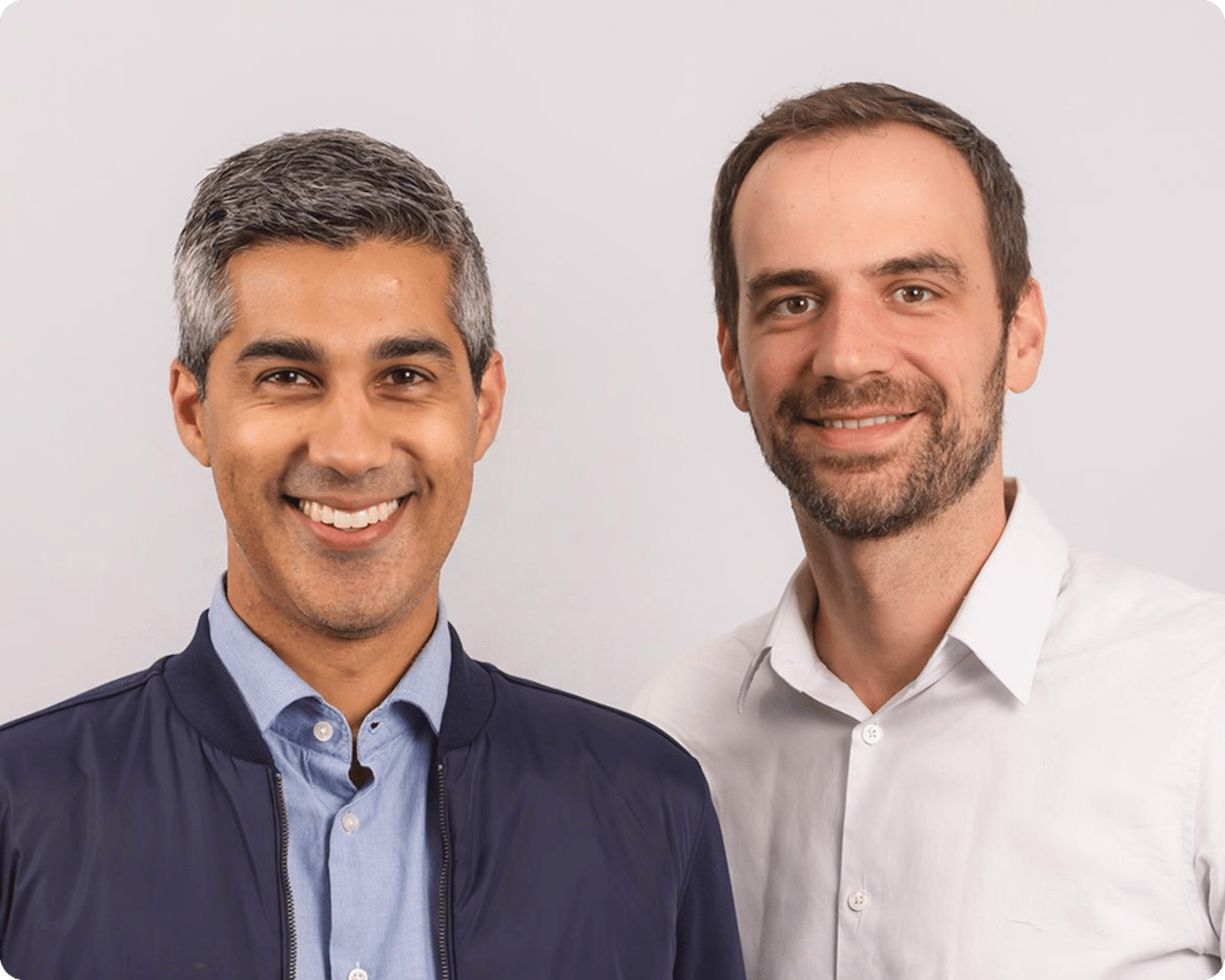 Kabir Shahani & Derek Slager smiling at camera